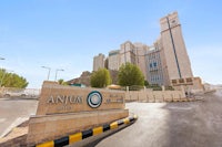 the entrance to the antrium hotel in abu dhabi